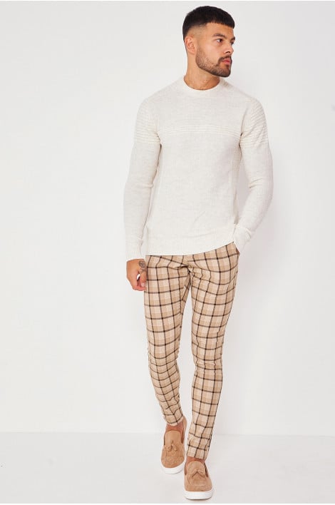 Pull beige col rond en maille à relief