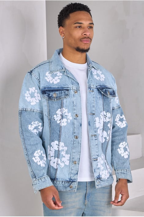Veste en jean bleu à fleurs blanches