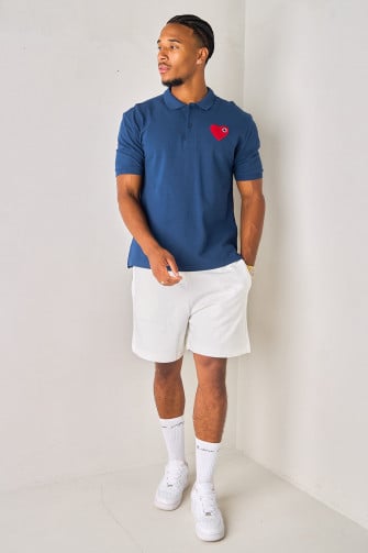 Polo bleu marine à empiècement cœur
