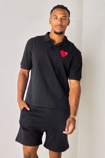 Polo noir à empiècement cœur