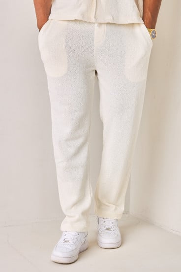 Pantalon coupe droite blanc en tissu texturé et ajouré